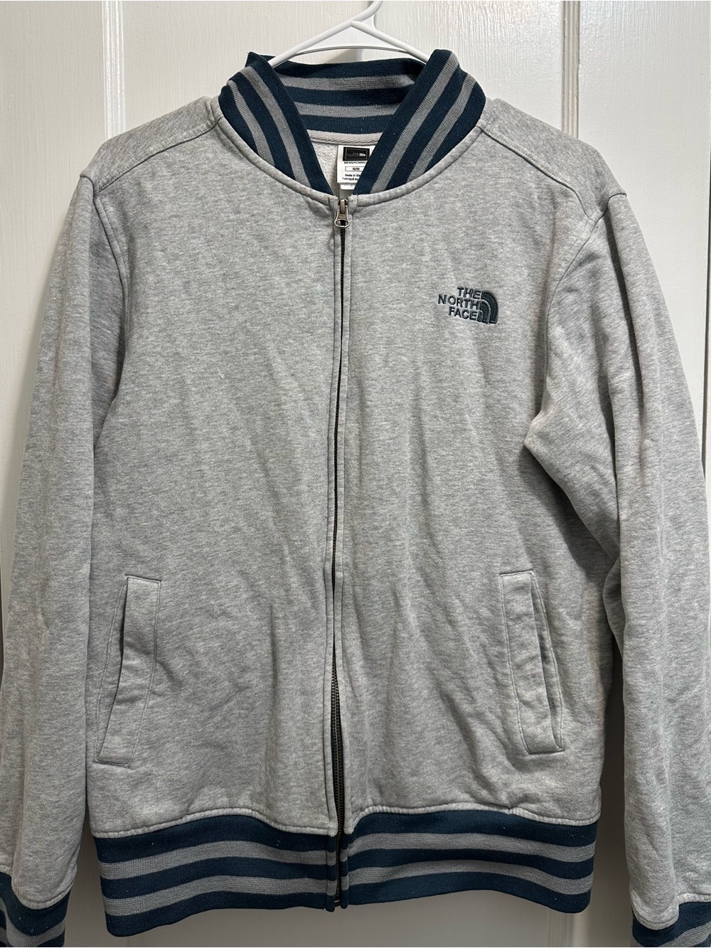 The North Face Light Gray Bomber Jacket with Navy Trim